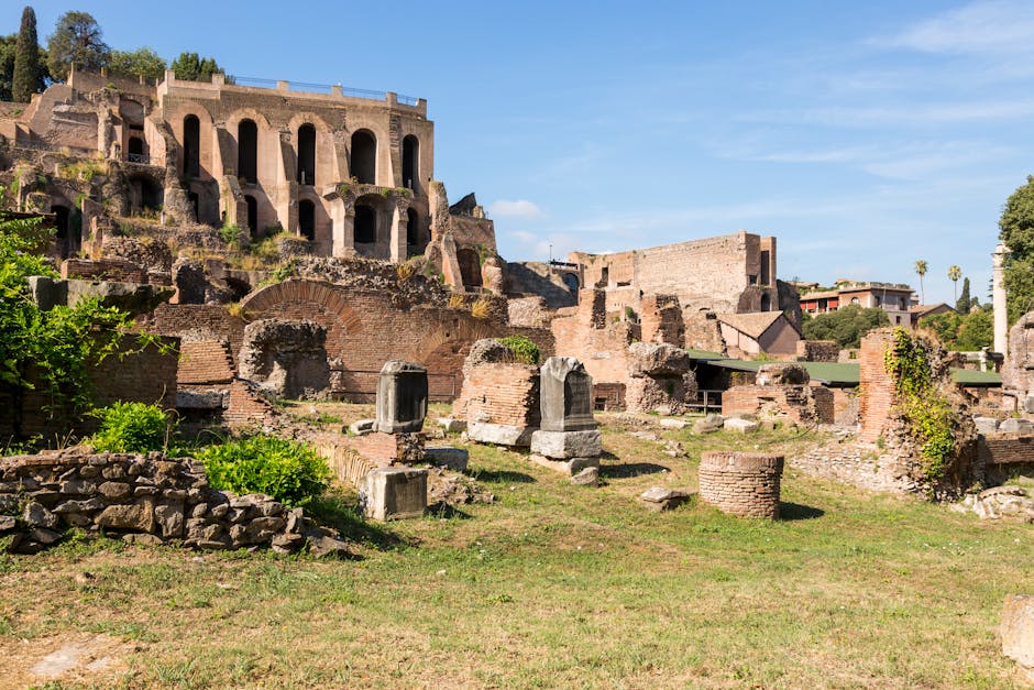 Explore ancient Roman ruins in Rome, showcasing historic architecture and rich history under a vibrant blue sky.